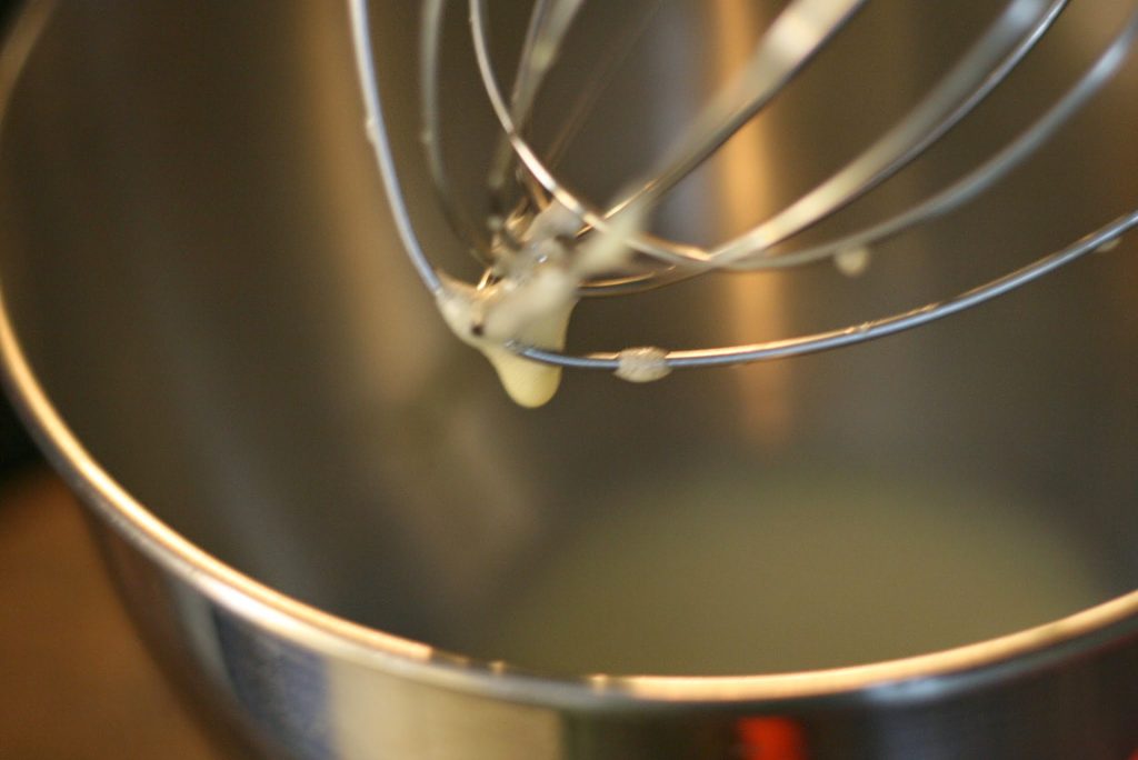 Whisked egg yolk and egg in a mixture. 