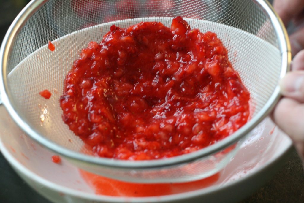 Processed and strained strawberries. 