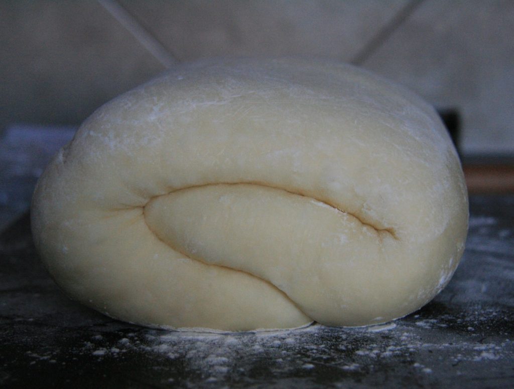 Pillowy-dough that has been proofed after laminating. Pillowy-dough that has been proofed after laminating.