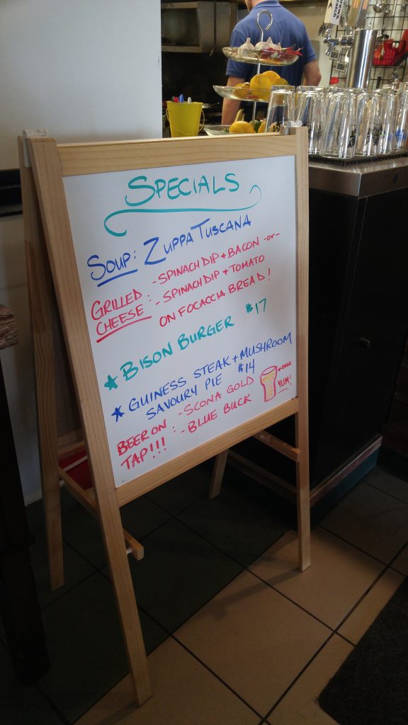 A mini whiteboard highlighting the specials at Juniper Cafe