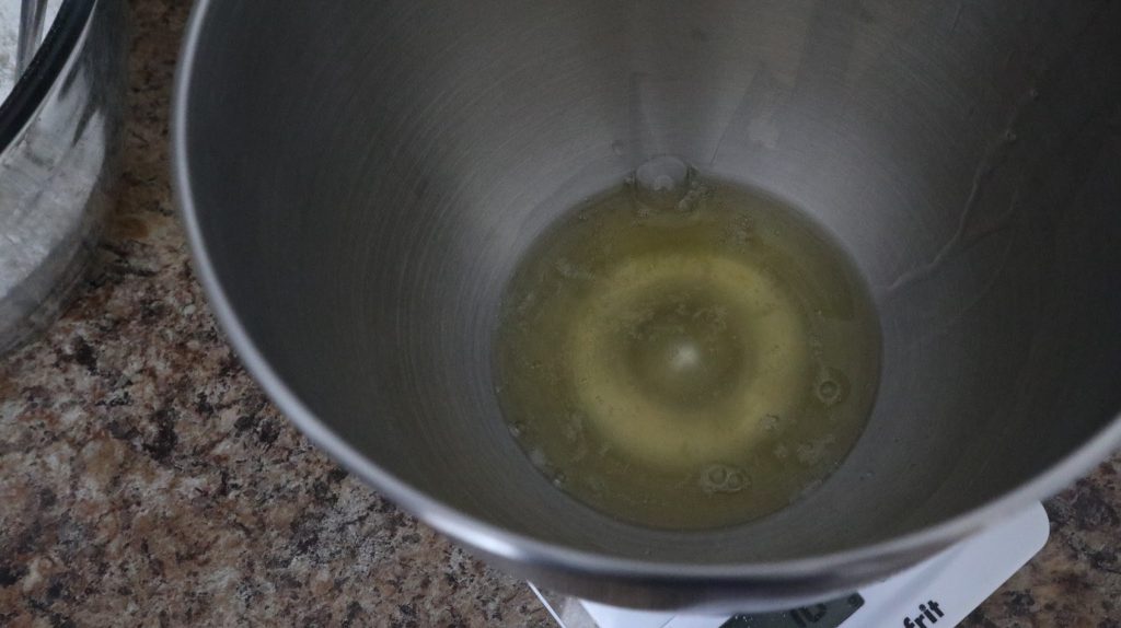egg whites in the bowl of a kitchen aid