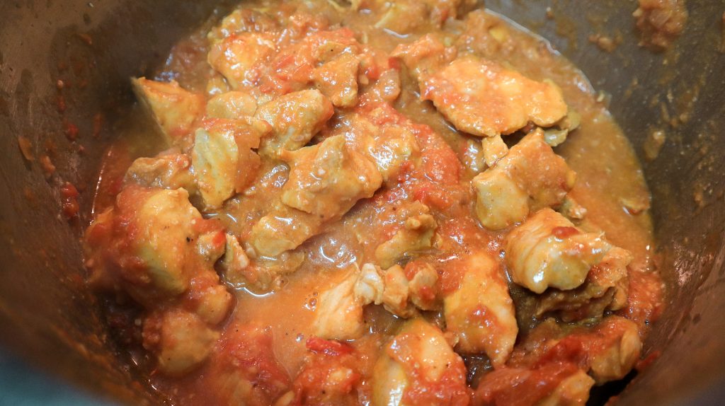 Butter Chicken in a pot while cooking